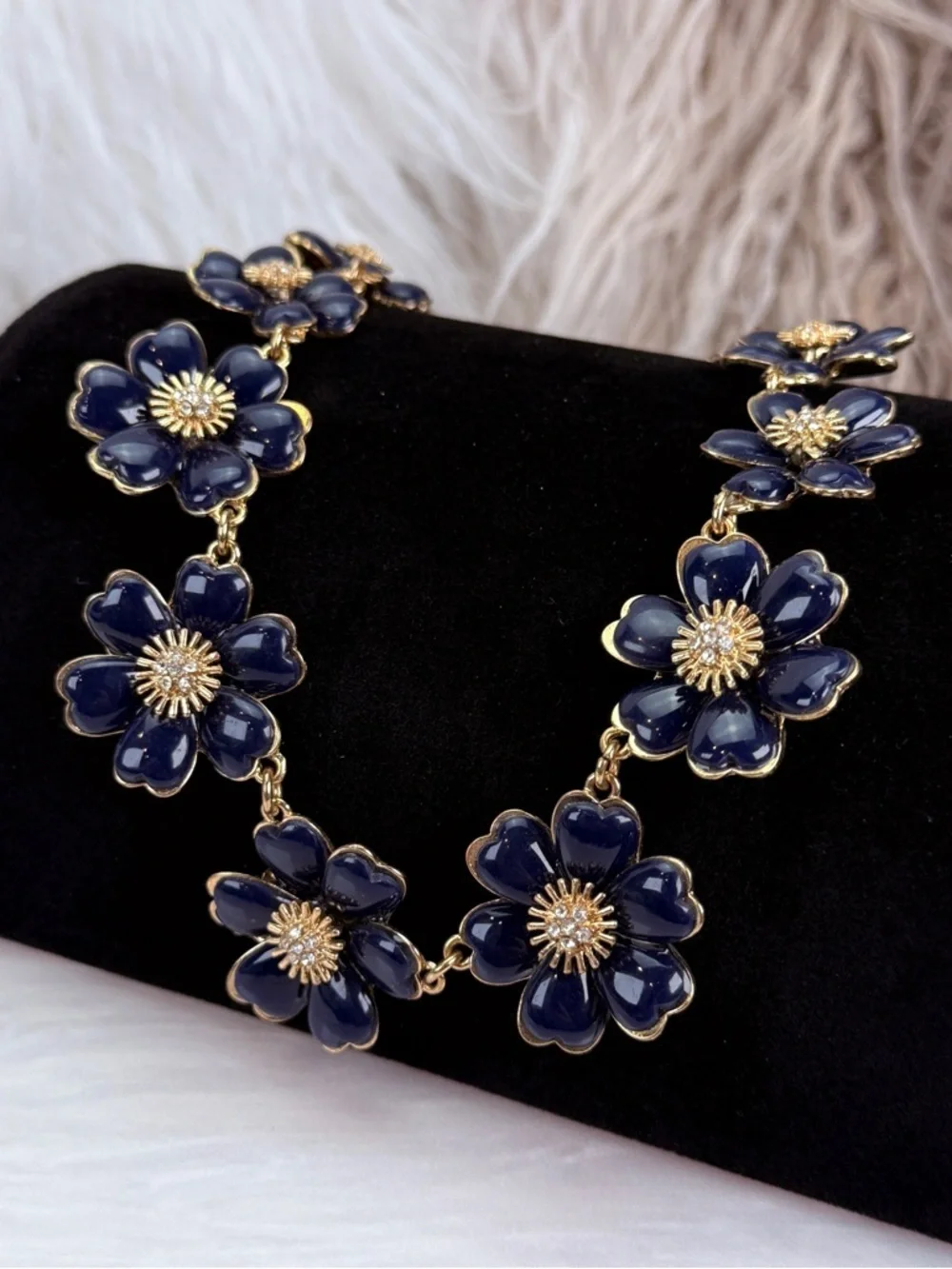 Beautiful, vintage goldtone, blue enamel, clear, bling weighted necklace